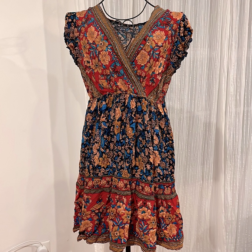 Used, great condition. Beautiful, vibrant dress. Boho style.